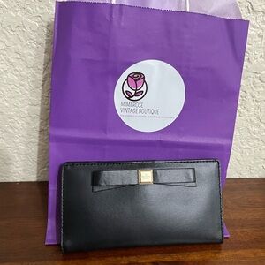 Kate Spade black leather wallet.